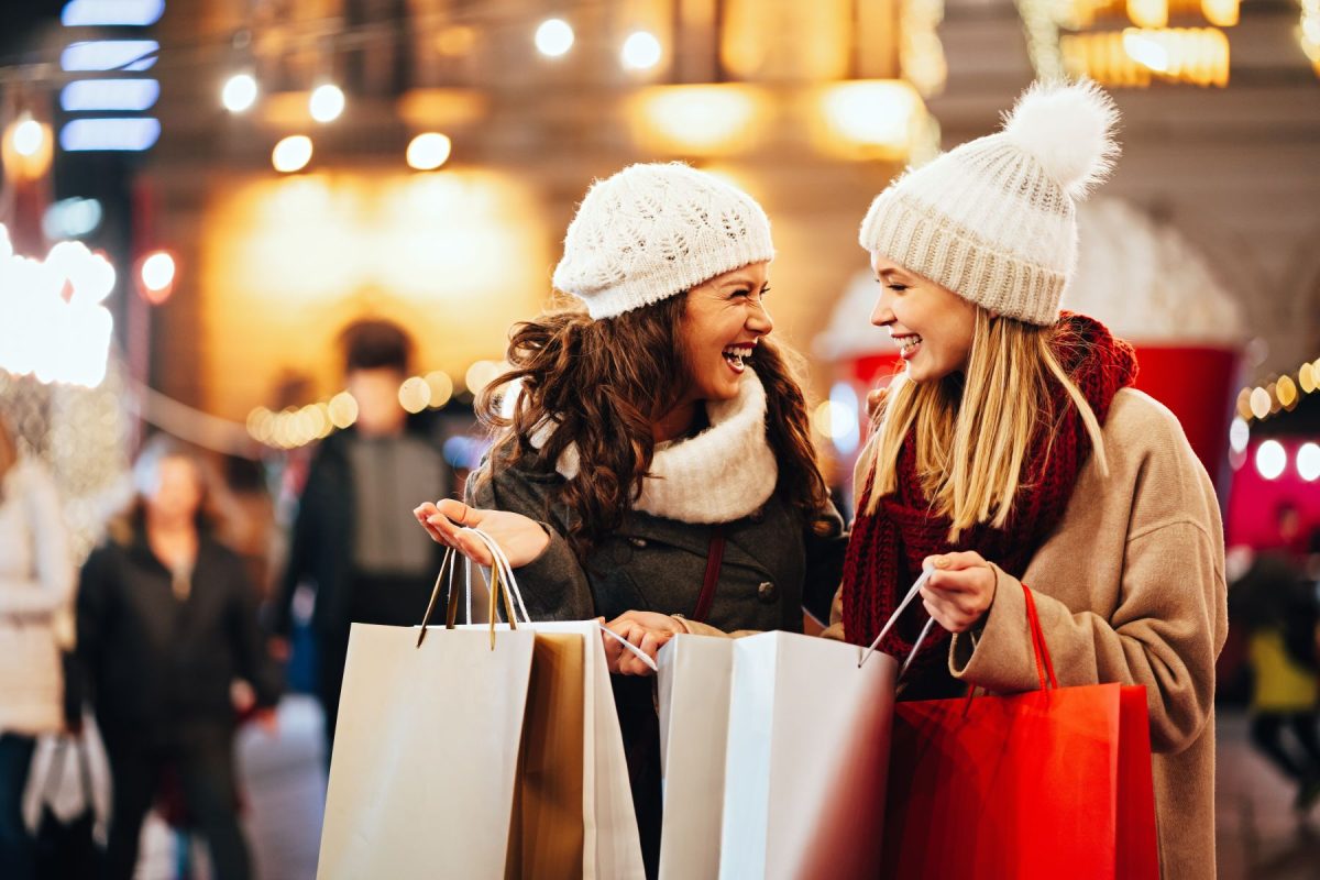 Women doing holiday shopping